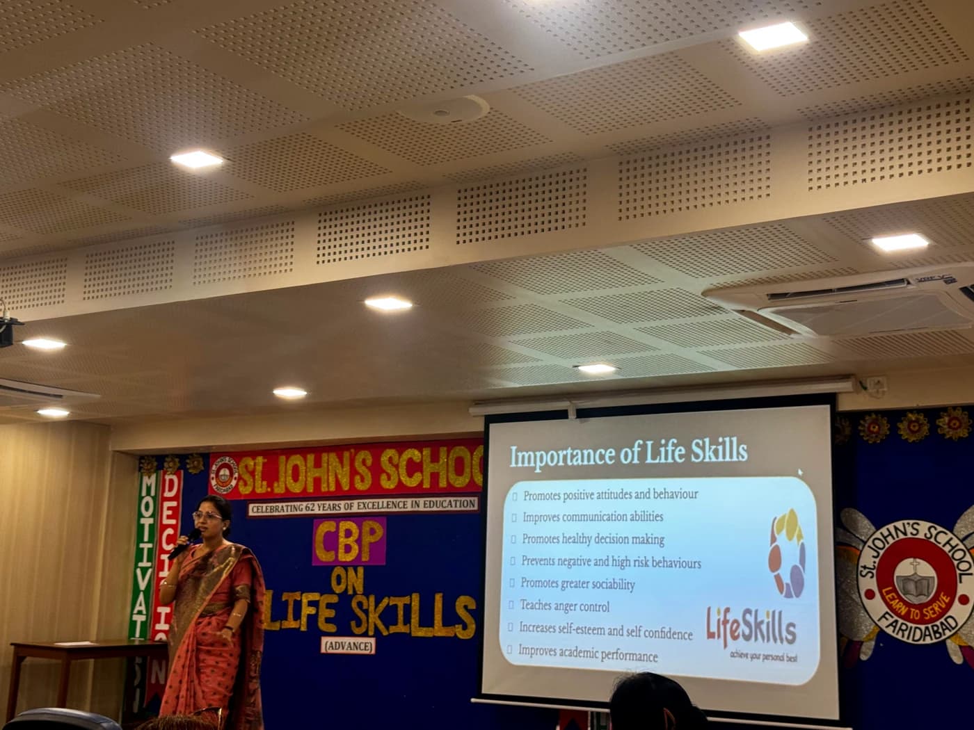 Lamhi presenting the Importance of Life Skills slide